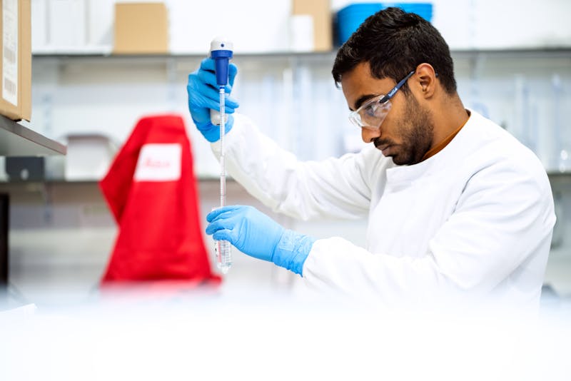 Scientist in genomics laboratory